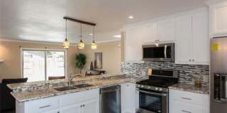 STUNNING 4-BEDROOM HOME WITH SOLAR, BEAUTIFUL UPGRADES & AN INCREDIBLE OUTDOOR ENTERTAINMENT AREA! Gallery 1