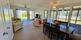 FULLY FURNISHED 2-Story Townhouse on Canal – Pool, Golf Views & ALL Utilities Included! FULLY FURNISHED 2-Story Townhouse on Canal – Pool, Golf Views & ALL Utilities Included! Gallery 1