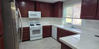 Beautifully Remodeled Tri Story Home located in a Gated Community ... Gallery 7