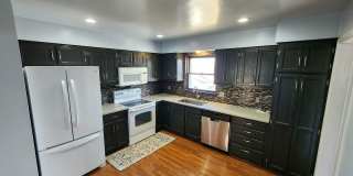 Updated West Side Home with Washer & Dryer + Fenced in Yard! Available August 6th! Gallery 3