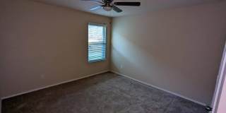 2 car garage with lighting, granite countertops. Backyard includes a custom extended concrete patio perfect for gatherings Gallery 12