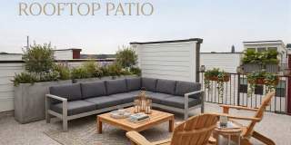 **OFFERING FIRST MONTH'S RENT FREE, $200 MOVE IN PROMOTION & REFUNDABLE APPLICATION FEES** New Construction 3BD, 2.5BA Raleigh Townhome-Style Condo with 1-Car Attached Garage & Rooftop Terrace in Downtown Raleigh Gallery 1