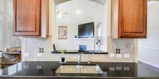 Beautiful one story stone home in Estates at Settlers Park Gallery 10