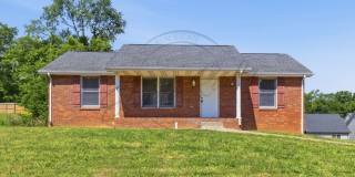 SPRING SPECIAL 1/2 OFF First Months Rent: Three Bedroom home in Clarksville with Basement! Gallery 1