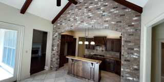 4 Bedroom, 3 Bathroom, Brick Home, Two Car Garage, Fireplace, High Ceilings, Granite Countertops, Fenced in Yard. Custom Built Home, Walkers Lake Subdivision , Triple-Split Floor Plan. Gallery 11