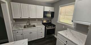3-Bedroom, 1.5-Bath Townhome with Finished Basement & Central A/C Gallery 1