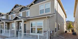 **MILITARY DISCOUNT OF $50/MO LIMITED TIME** NEWER END UNIT TWO STORY TOWNHOME WITH A/C & 1 CAR GARAGE & PIKES PEAK VIEWS! Gallery 1