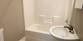 Spacious 2 bed/1 bath home! Fenced yard, a/c, d/w, w/d, large garage and MORE!! Gallery 15