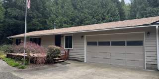 Cozy one story home on beautiful close to town acreage. Gallery 1