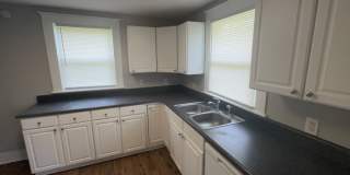 UPDATED 2-BEDROOM HOME MINUTES FROM DOWNTOWN — HOUSING VOUCHERS ACCEPTED! Gallery 3