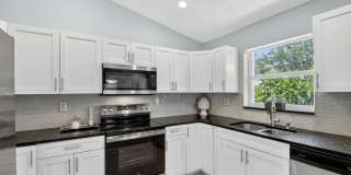 Sophisticated 3BD/2BA Furnished Single-Family Home in the Heart of Greenacres Gated Community Gallery 14