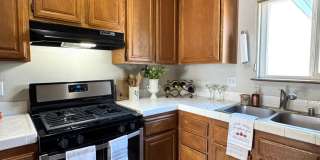 Charming 2 bed 1.5 bath condo, with attached 2 car garage! Gallery 1