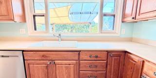 Charming Updated 1950s Home with Refinished Hardwoods & Large Fenced Yard – Landscaping Included! Gallery 6