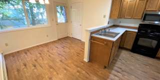 2 Bed 1.5 Bath Condo! W/S/G/Lawn Care Included! Gallery 1