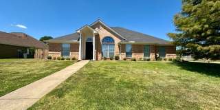 Spacious Flint Home on a Corner Lot with Stunning Primary Suite Gallery 1