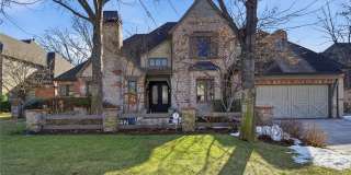 Exquisite custom home with high end finishes located in the gated community of Maple Ridge Village Gallery 1