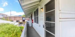 Waiola - upstairs 1 bedroom with 1 parking - window air conditioner in bedroom.. Gallery 15