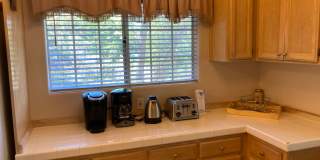 Location! Location! Terrific Four bedroom Three Bath Home with Two Car Garage including Lake Rights! Gallery 9