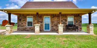 FOR LEASE! Enjoy Quiet Country Living in this Cute 2 BR - 1 BA Brick Home on 1 Acre in Millsap ISD. Gallery 1