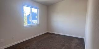 2 Bedroom 1 bath house with extra large double car garage and extra storage space! Gallery 12