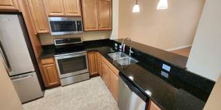Beautiful 2/2 Bouchelle Condo with private garage Gallery 1