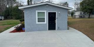 RENOVATED 3/2 w/ Den, Granite Counters, Stainless Appliances, Washer/Dryer, & Plank Vinyl Floors! Furnished or Unfurnished, Inc Lawn Maint! Avail NOW for $1775/month! Gallery 21