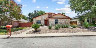 Charming 3-Bedroom Home with Stone Fireplace & Mature Trees Gallery 1
