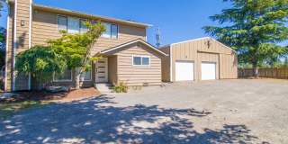 Completely Remodeled 4BR Home with Massive Shop/Garage & Large Fenced Yard Gallery 1
