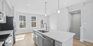 This home presents a harmonious blend of elegance, flexibility, and modern convenience within a welcoming community setting. Gallery 13