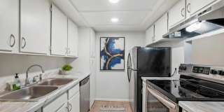 Updated 1 Bed Condo | Reserved Parking, Covered Patio & Fireplace Gallery 5