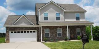 Fairview Station Charmer!  Perfectly comfortable 4/2.5 family home close to Westwood Elementary. Gallery 1