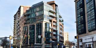 Stunning 2 bed (Primary bedroom + den w/closet), 2 bath condo located in the heart of downtown Bethesda. Gallery 1