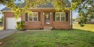 Charming Brick Home with Soaring Ceilings & Updated Finishes! Gallery 1