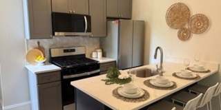 Fully Renovated 4-Bedroom Home with Primary Suite, Central Air & Rear Parking Gallery 1