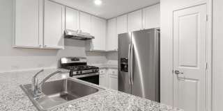 This beautiful single-story home has 4 bedrooms, 2 baths, vinyl flooring throughout, an open floor plan Gallery 6
