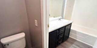 4 Bed / 2 Full Bath House with Brand-New Kitchen, Attached Garage, and Full Basement - Built 2001 Gallery 13
