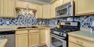 East Anchorage Home with Utilities Included!! Close to JBER! Attached Two Car Garage + Fenced in Yard Gallery 1