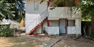1 bed downstairs unit with courtyard, laundry access,brand new appliances, paint and flooring, includes all utilities up to 200 monthly Gallery 4
