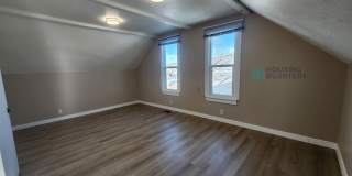 This 3-bed, 1-bath home features original woodwork, a covered front porch, a fenced yard, and an oversized detached garage! Gallery 13