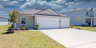 Spacious and beautifully designed 4-bedroom, 2-bath home offering 2,147 square feet of living space & a 3-car garage, perfectly situated on a serene pond lot Gallery 1