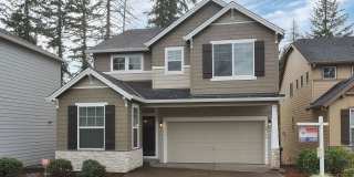 Bright and Open Floor Plan with Fireplace, Attached Garage & Vaulted Ceilings Gallery 1
