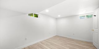 Charming Wheaton Cottage w/ Solar Panels, Finished Basement & 2-Car Garage Gallery 11