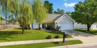 Welcome home to 304 Carriage Wheel Road, where comfort meets convenience! Gallery 1