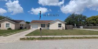 Great Location!  Charming, TRUE 3/2/1, 1283sq ft home with RENOVATED bathrooms & kitchen, fenced in yard! Gallery 1