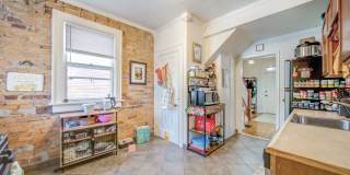 Charming 5-Bedroom Home with Exposed Brick and Modern Upgrades Gallery 12