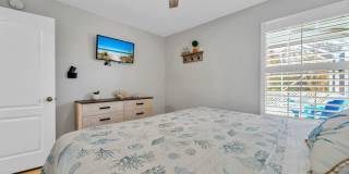 Gorgeous 4 bedroom pool house for rent w/ deeded beach access + pool & yard service included in the rent! Gallery 34