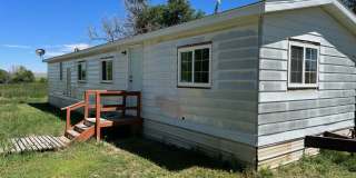 Semi-Rural 2 Bedroom 1 Bath Updated Mobile Home w/ Amenities Gallery 1