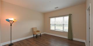 **PRISTINE GARDEN-LEVEL CONDO ON THE FIRST LEVEL NEAR PAVILION AND COMMUNITY GREEN SPACE** Gallery 31