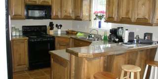 Comfortable 3BR/2BA Home with Privacy Fenced Yard  Covered Porches Gallery 1