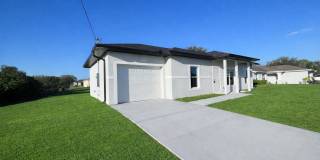 NEW CONSTRUCTION- Modern 3 Bed / 2 Bath Home in E Lehigh Acres NEW CONSTRUCTION- Modern 3 Bed / 2 Bath Home in E Lehigh Acres Gallery 1